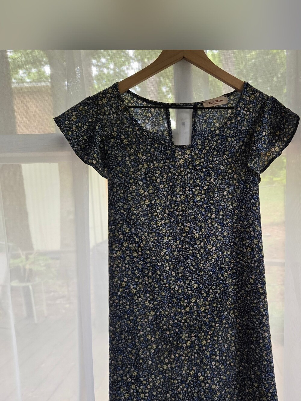 Full Moon Maternity blue & green floral print blouse with flutter sleeves.